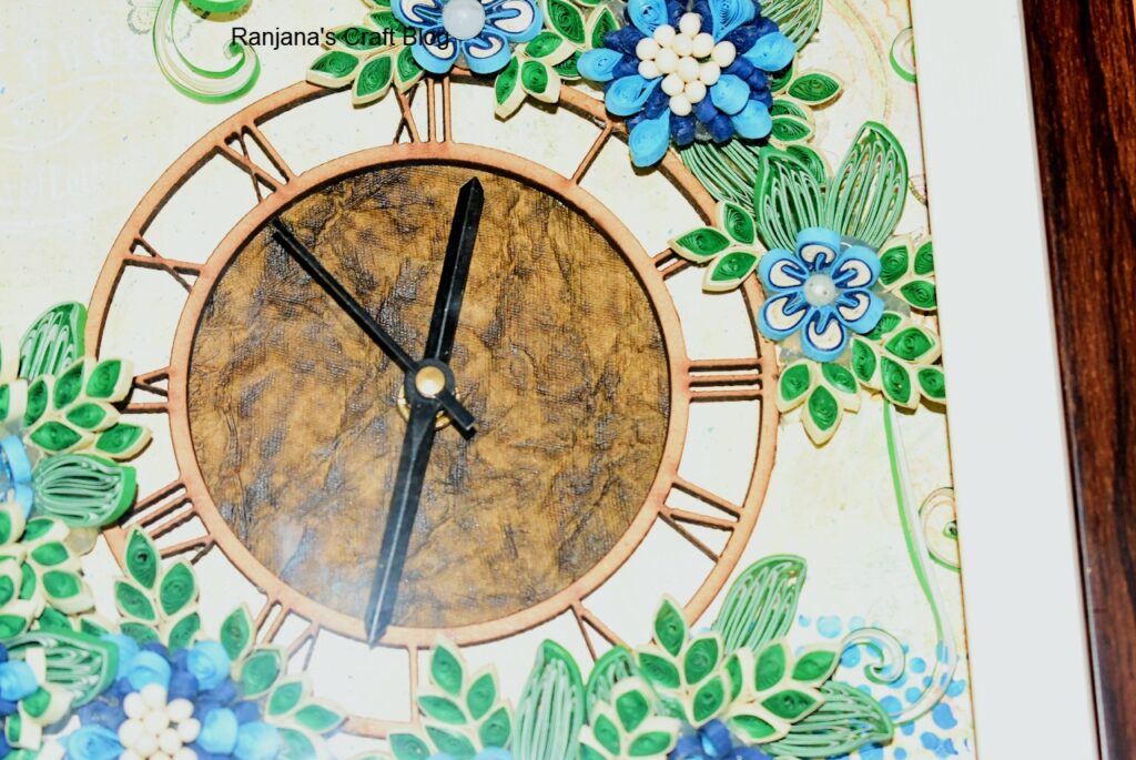 handmade clock with quilling